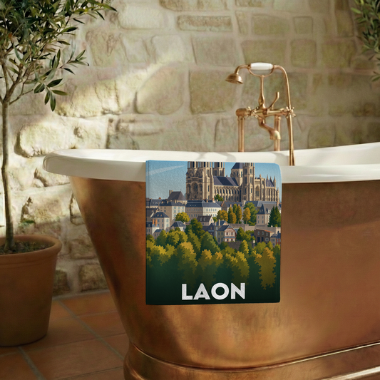 Serviette de bain souvenir de la ville de Laon avec une illustration stylisée.