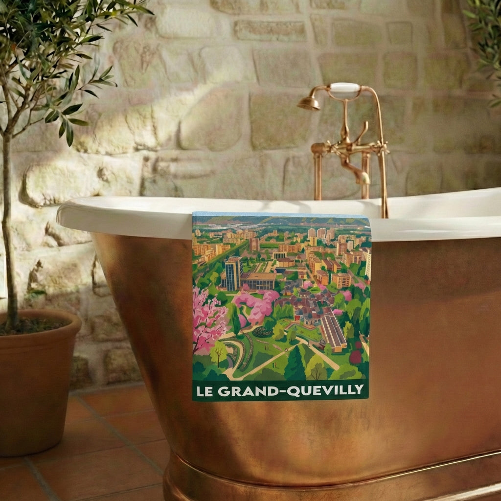 Serviette de bain souvenir de la ville du Grand-Quevilly avec une illustration stylisée.
