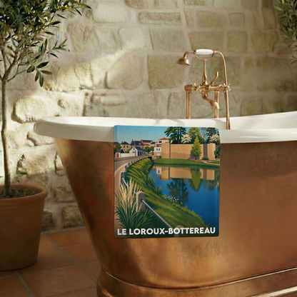 Serviette de bain souvenir de la ville du Loroux-Bottereau avec une illustration stylisée.