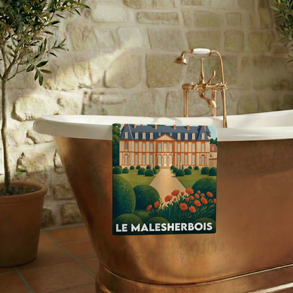 Serviette de bain souvenir de la ville de Le Malesherbois avec une illustration stylisée d'un château.
