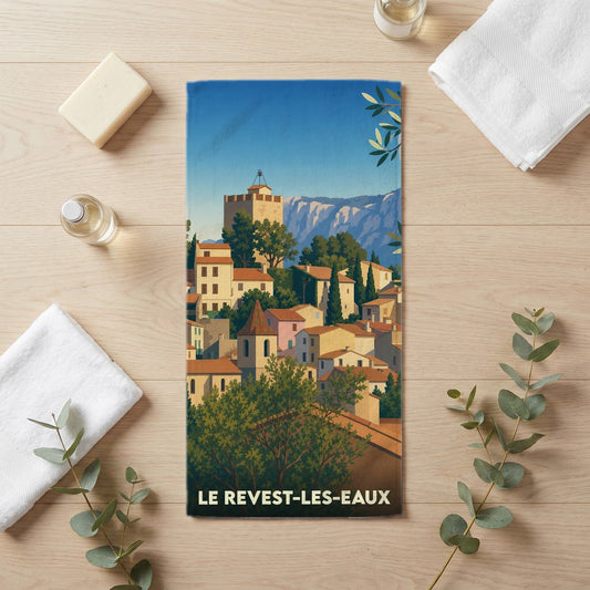 Serviette de bain souvenir de la ville de Le Revest-les-Eaux avec une illustration stylisée.