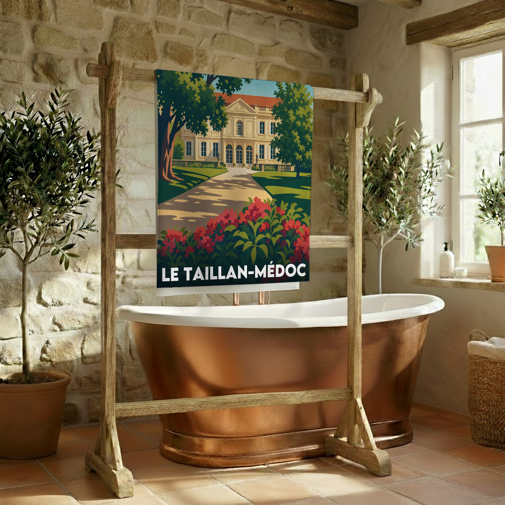 Serviette de bain souvenir de la ville de Le Taillan-Médoc avec une illustration stylisée d'un château.