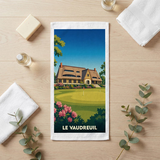 Serviette de bain souvenir de la ville de Le Vaudreuil avec une illustration stylisée de son golf.