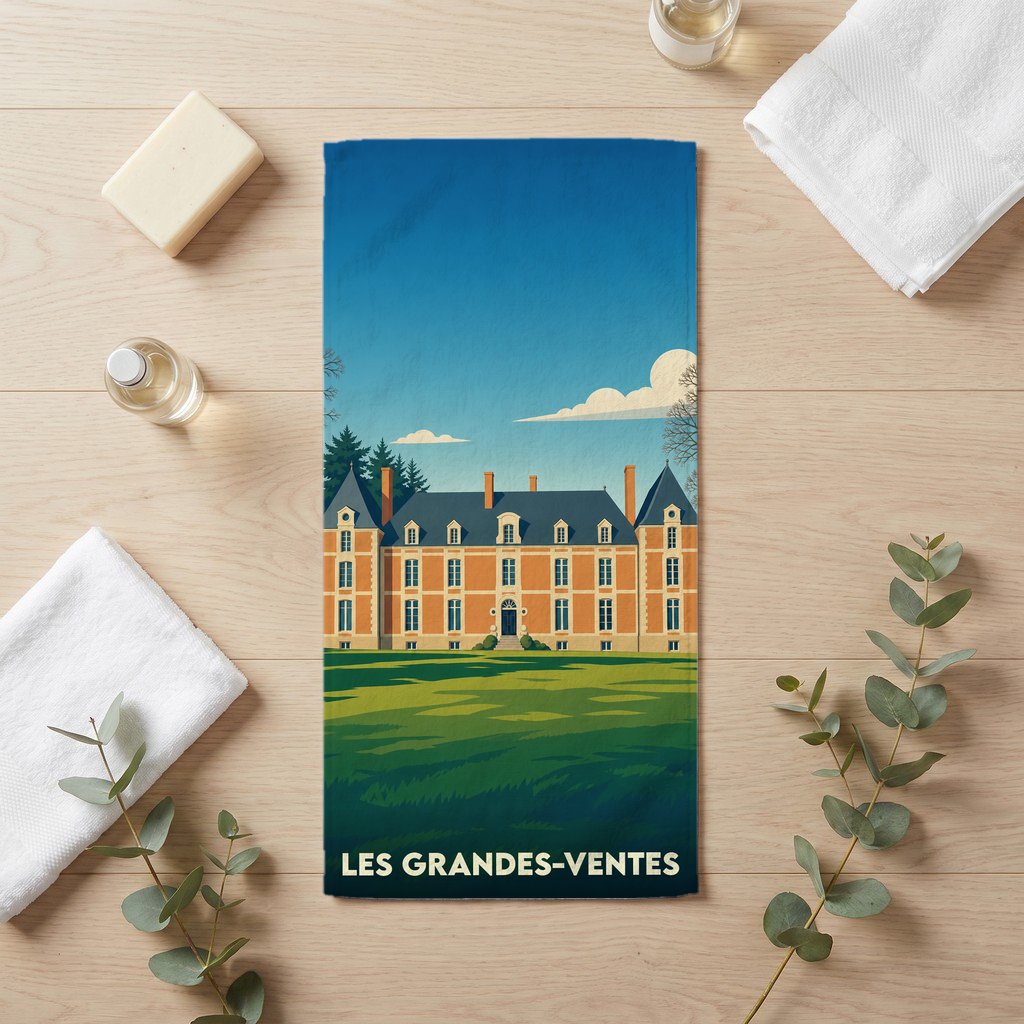 Serviette de bain souvenir de la ville de Les Grandes-Ventes avec une illustration stylisée de son château.