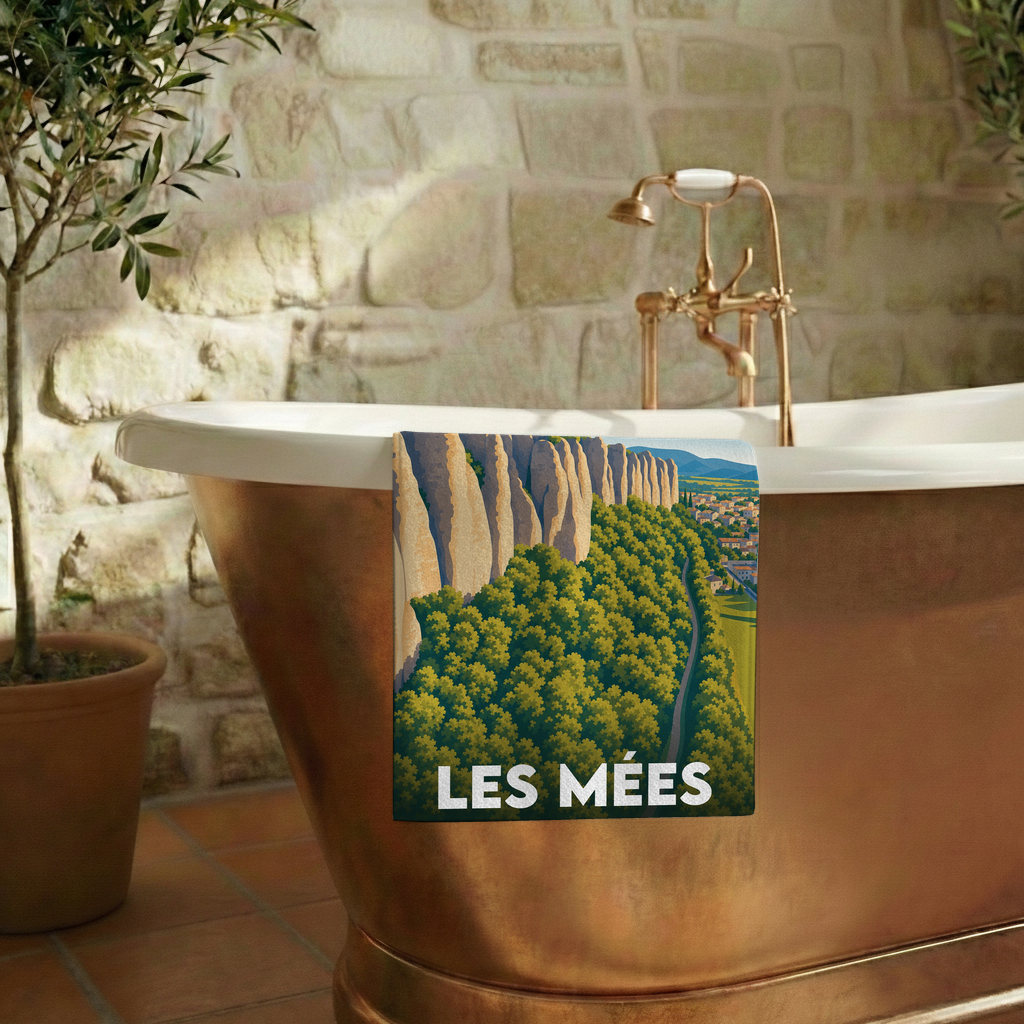 Serviette de bain souvenir de la ville de Les Mées avec une illustration stylisée.
