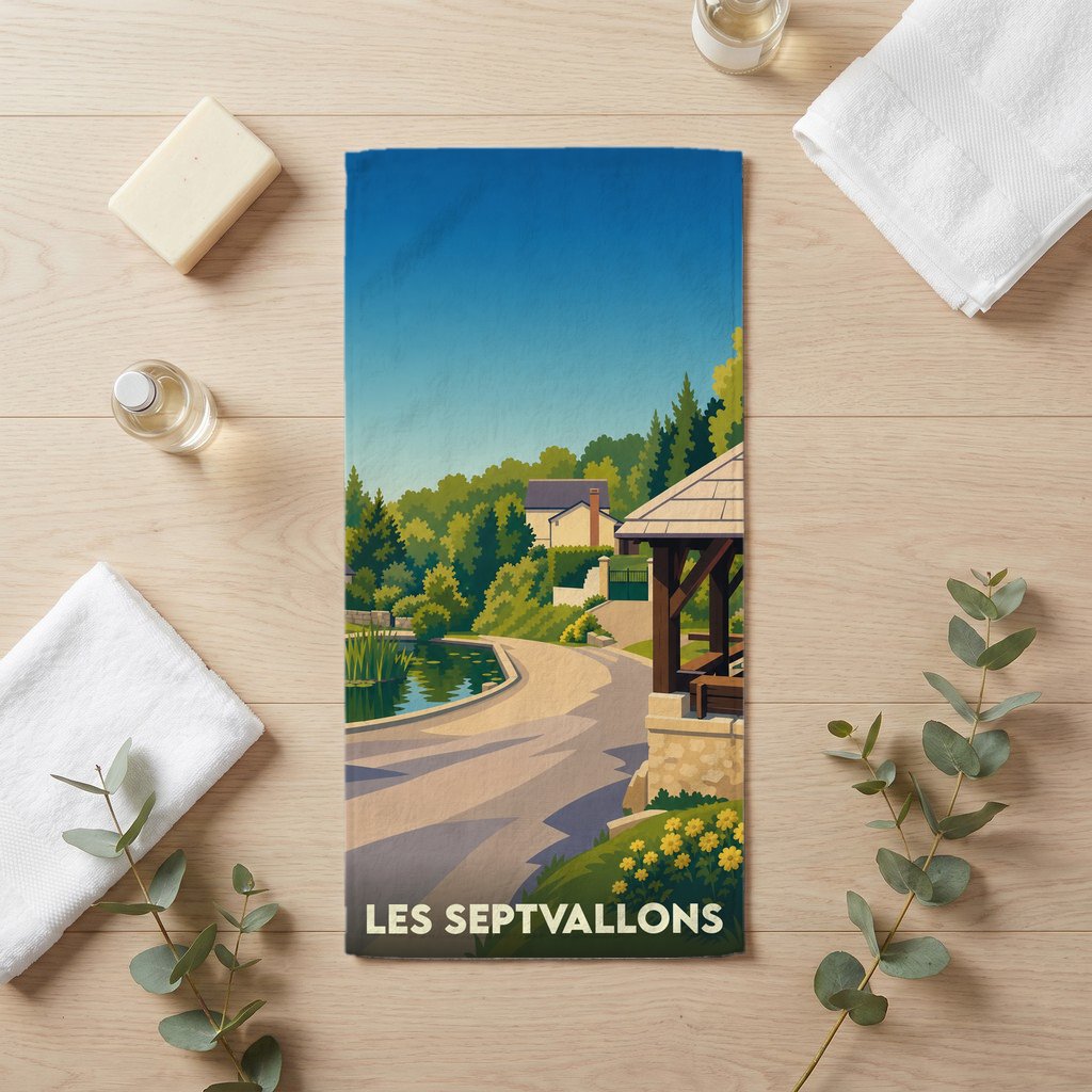 Serviette de bain souvenir de la ville de Les Septvallons avec une illustration stylisée.