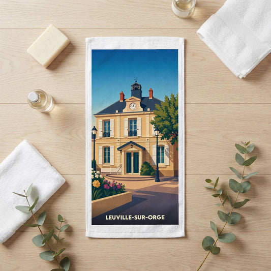 Serviette de bain souvenir de la ville de Leuville-sur-Orge avec une illustration stylisée de la mairie.