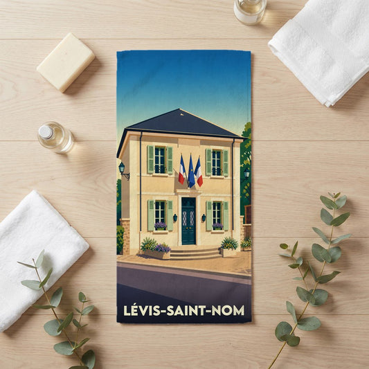 Serviette de bain souvenir de la ville de Lévis-Saint-Nom avec une illustration stylisée de sa mairie.
