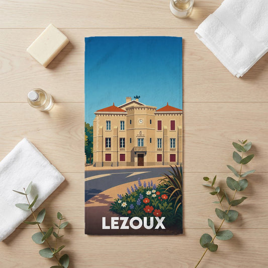 Serviette de bain souvenir de la ville de Lezoux avec une illustration stylisée.