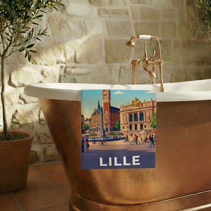 Serviette de bain souvenir de la ville de Lille avec une illustration stylisée et colorée.