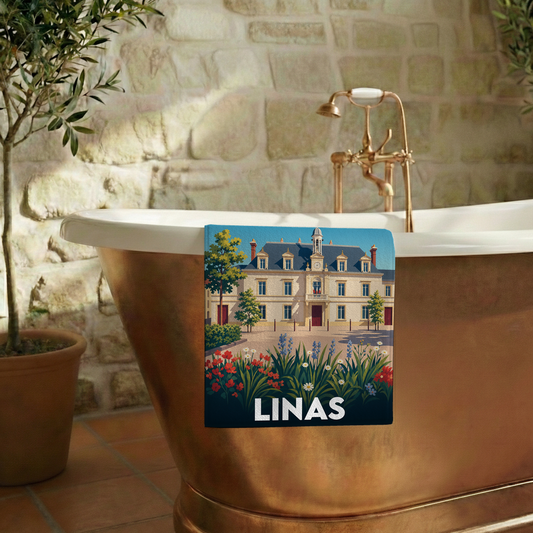 Serviette de bain souvenir de la ville de Linas avec une illustration stylisée.
