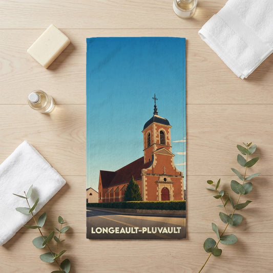 Serviette de bain souvenir de la ville de Longeault-Pluvault avec une illustration stylisée de son église.
