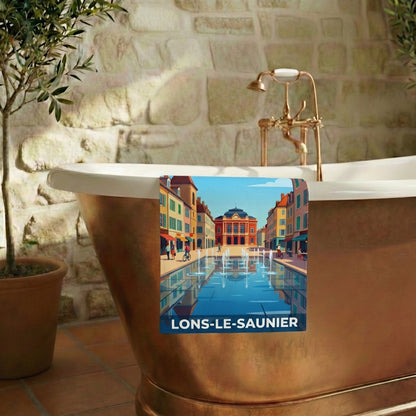 Serviette de bain souvenir de la ville de Lons-le-Saunier avec une illustration stylisée.