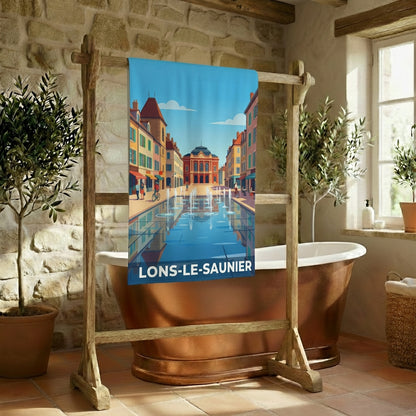 Serviette de bain souvenir de la ville de Lons-le-Saunier avec une illustration stylisée.