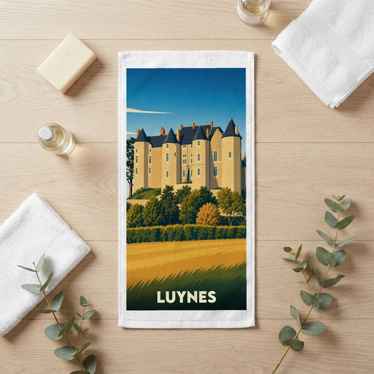 Serviette de bain souvenir de la ville de Luynes avec une illustration stylisée de son château.