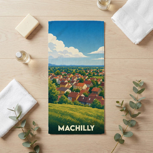 Serviette de bain souvenir de la ville de Machilly illustrée d'un paysage urbain stylisé.