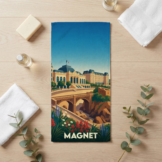 Serviette de bain souvenir de la ville de Magnet avec une illustration stylisée.