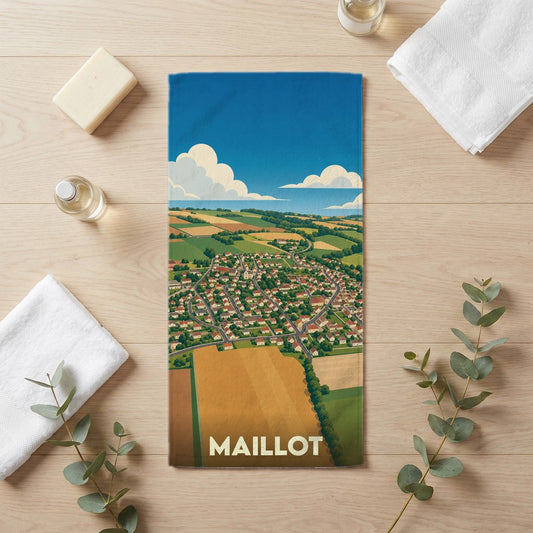 Serviette de bain souvenir de la ville de Maillot avec une illustration stylisée de son paysage rural.