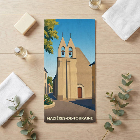 Serviette de bain souvenir de Mazières-de-Touraine illustrant son église avec un style graphique épuré.