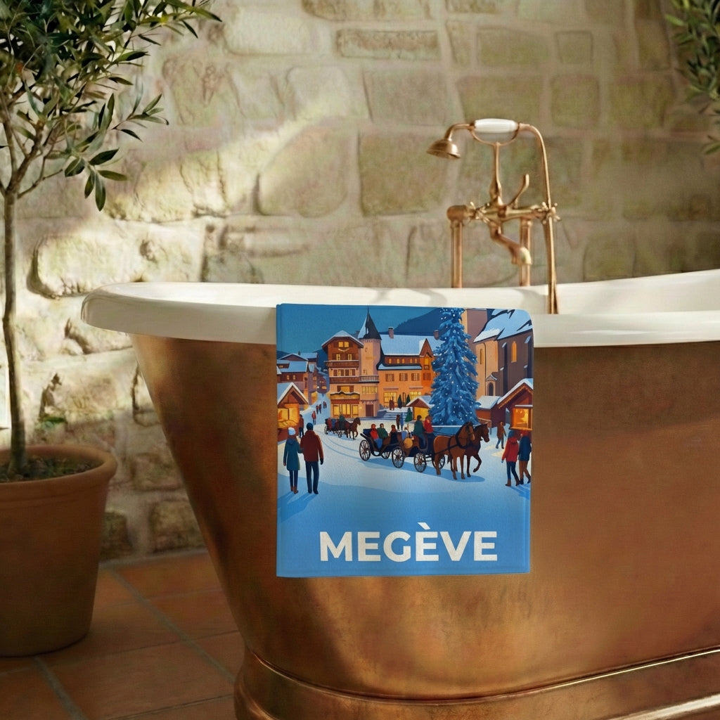 Serviette de bain souvenir de la ville de Megève avec une illustration hivernale stylisée.