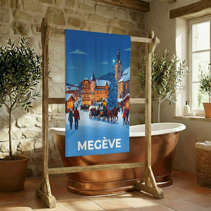Serviette de bain souvenir de la ville de Megève avec une illustration hivernale stylisée.