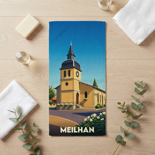Serviette de bain souvenir de la ville de Meilhan avec une illustration stylisée de son église.