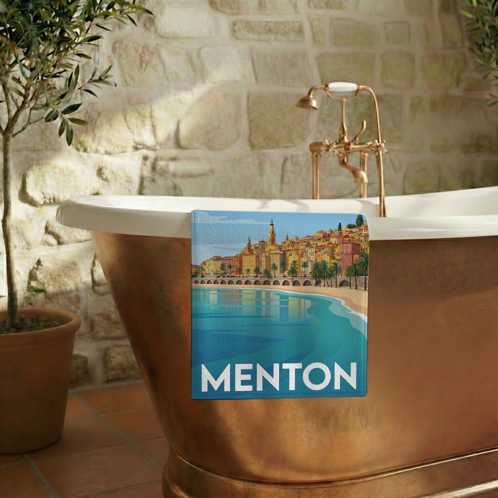 Serviette de bain souvenir de la ville de Menton avec une illustration stylisée de son paysage côtier.