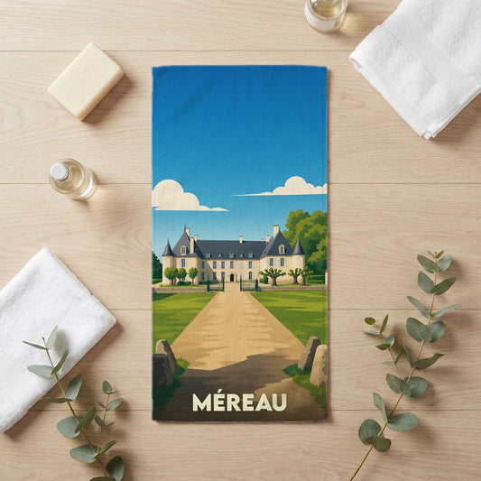 Serviette de bain souvenir de la ville de Méreau illustrée par un château de style classique.