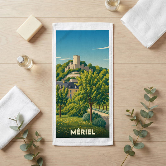 Serviette de bain souvenir de la ville de Mériel avec une illustration stylisée d'un château et de paysages verdoyants.