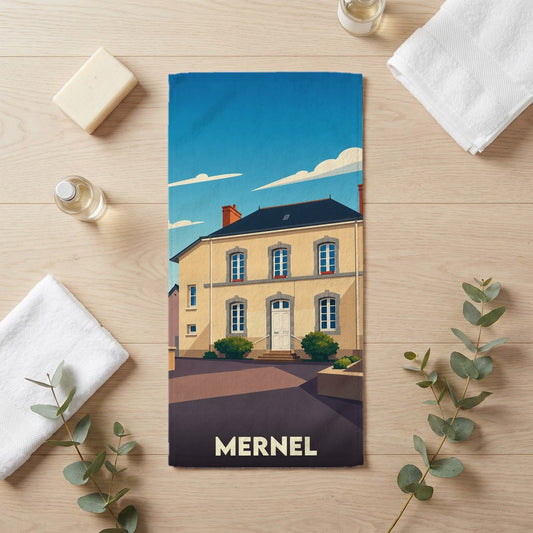 Serviette de bain souvenir de la ville de Mernel avec une illustration stylisée.