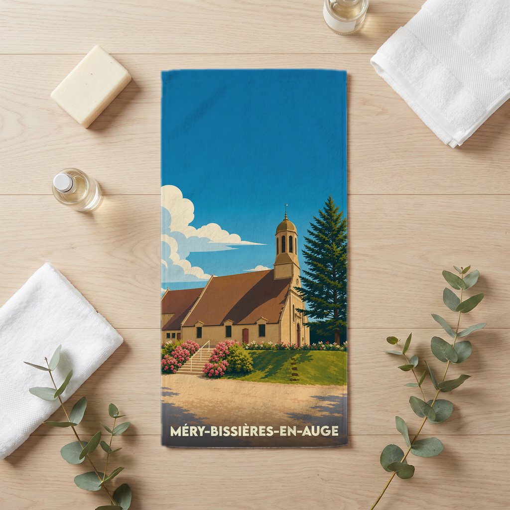 Serviette de bain souvenir de la ville de Méry-Bissières-en-Auge avec une illustration de son église.