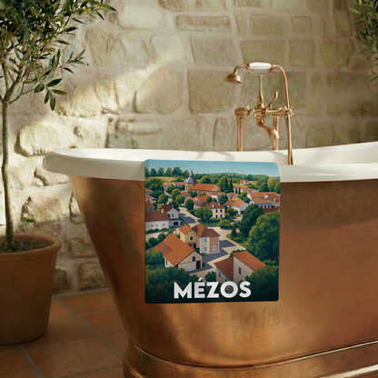 Serviette de bain souvenir de la ville de Mézos avec une illustration stylisée.