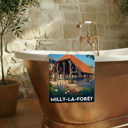 Serviette de bain souvenir de la ville de Milly-la-Forêt avec une illustration stylisée.