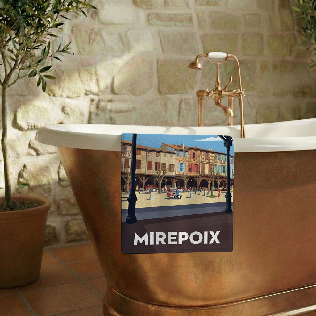 Serviette de bain souvenir de la ville de Mirepoix avec une illustration stylisée.