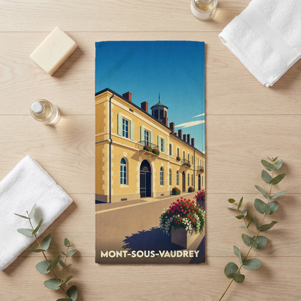 Serviette de bain souvenir de la ville de Mont-sous-Vaudrey avec une illustration stylisée d'un bâtiment historique fleuri.