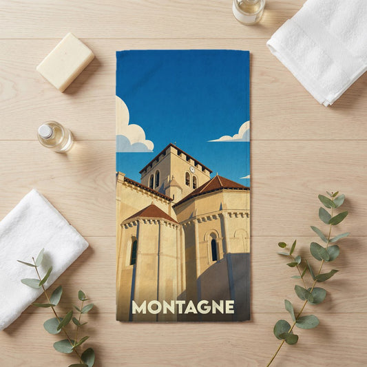 Serviette de bain souvenir de la ville de Montagne avec une illustration stylisée de son église.