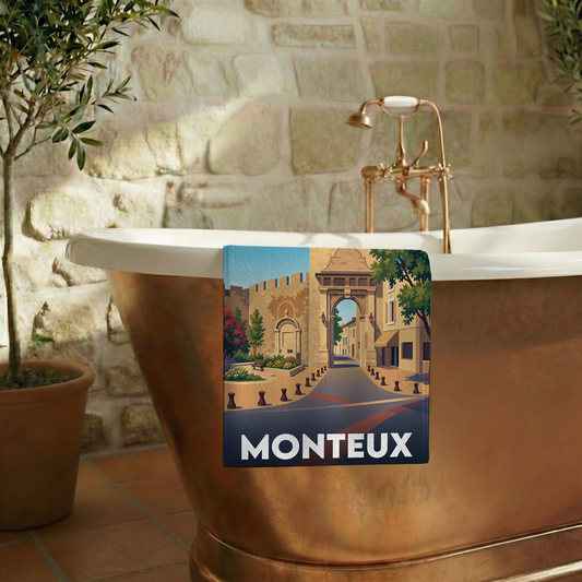 Serviette de bain souvenir de la ville de Monteux avec une illustration stylisée.