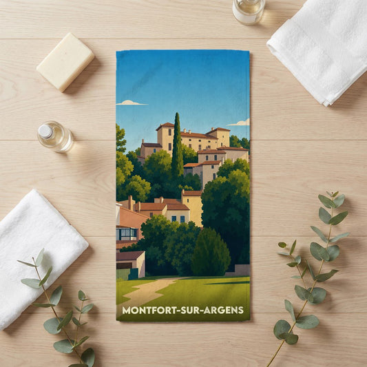Serviette de bain souvenir de la ville de Montfort-sur-Argens avec une illustration stylisée.