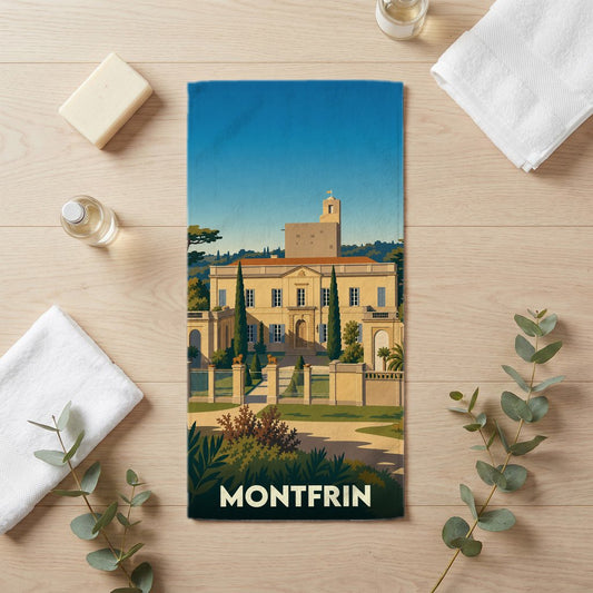 Serviette de bain souvenir de la ville de Montfrin avec une illustration stylisée d'un château provençal.