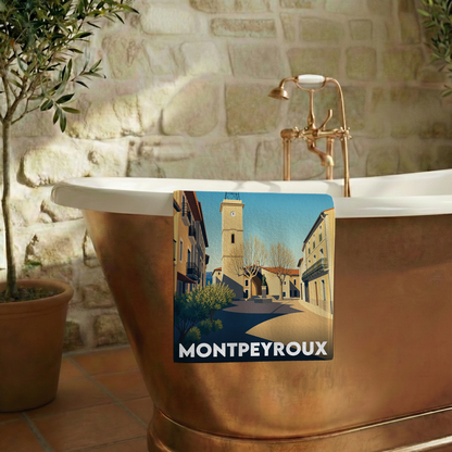 Serviette de bain souvenir de la ville de Montpeyroux avec une illustration stylisée.