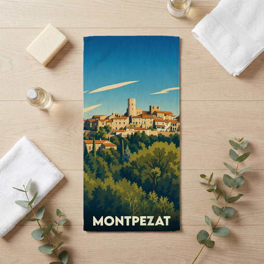 Serviette de bain souvenir de la ville de Montpezat avec une illustration stylisée de son paysage urbain.