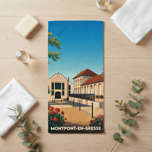 Serviette de bain souvenir de la ville de Montpont-en-Bresse avec une illustration stylisée de son architecture locale.