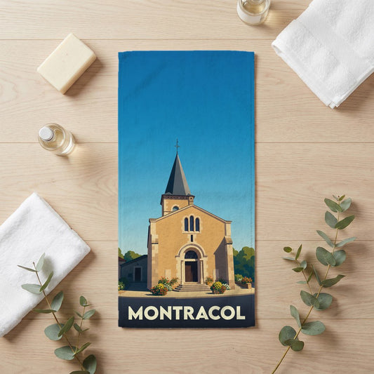 Serviette de bain souvenir de la ville de Montracol avec une illustration stylisée de son église.