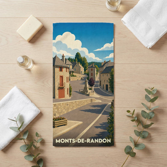 Serviette de bain souvenir de la ville de Monts-de-Randon avec une illustration stylisée.