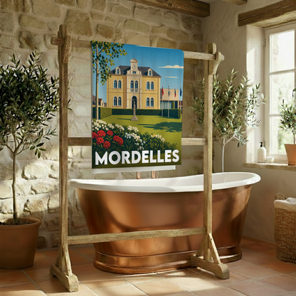 Serviette de bain souvenir de la ville de Mordelles avec une illustration stylisée.