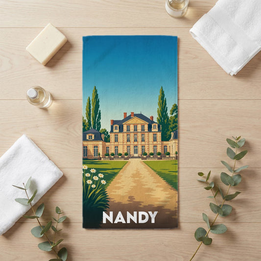 Serviette de bain souvenir de la ville de Nandy avec une illustration stylisée d'un château.