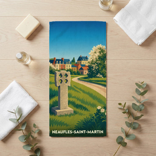 Serviette de bain souvenir de la ville de Neaufles-Saint-Martin avec une illustration stylisée d'un paysage champêtre.
