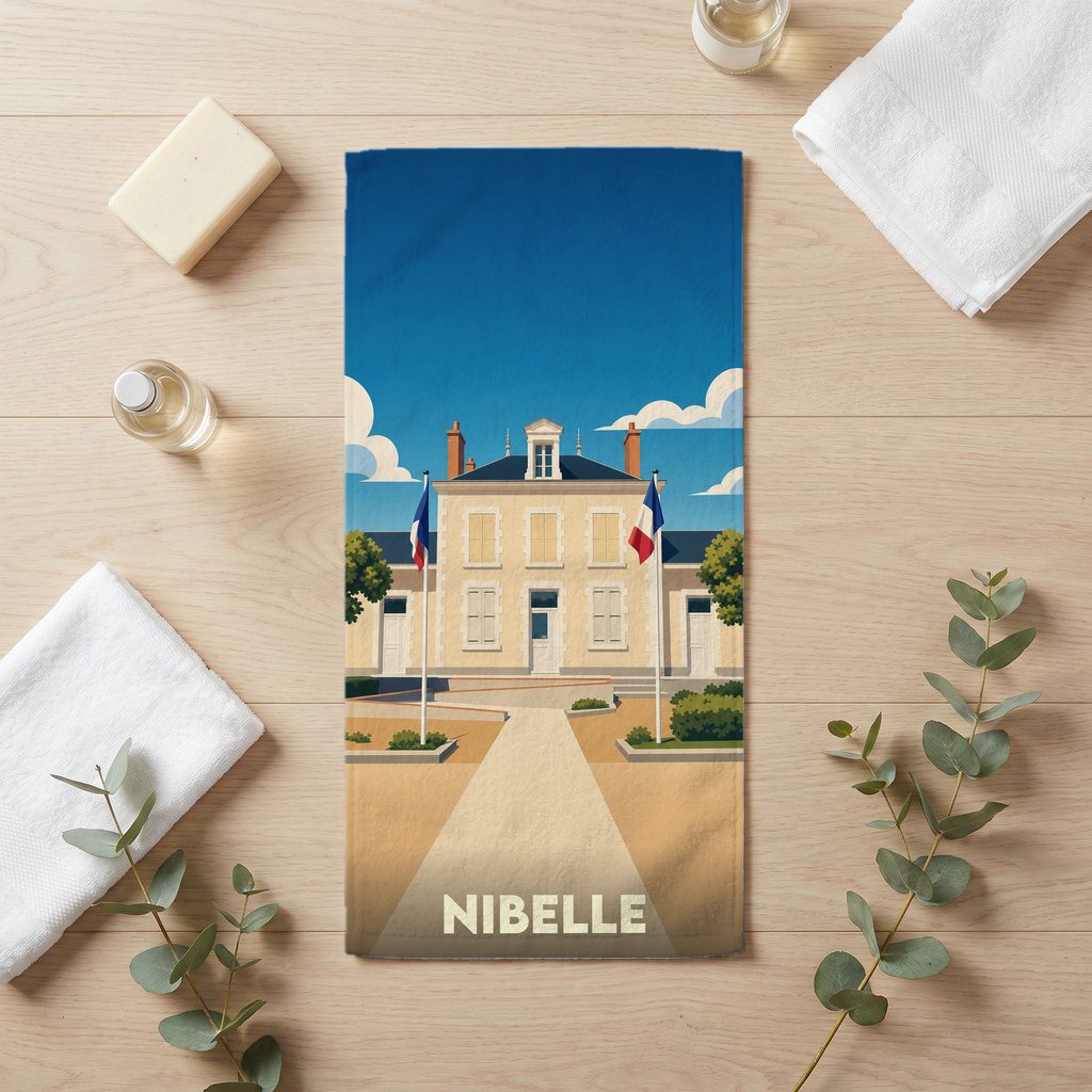 Serviette de bain souvenir de la ville de Nibelle avec une illustration stylisée de sa mairie.