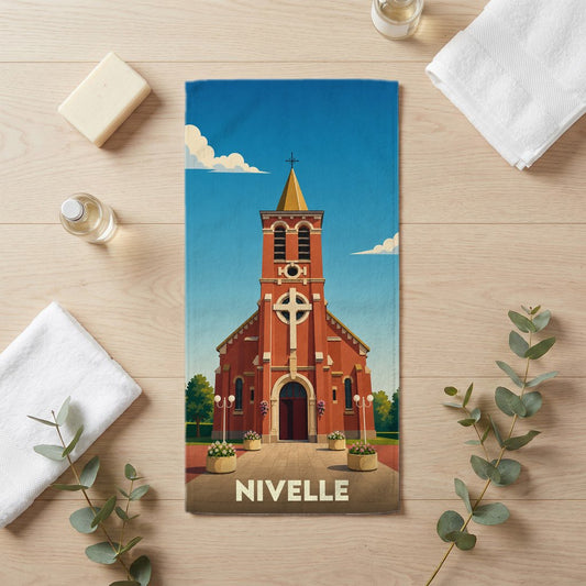 Serviette de bain souvenir de la ville de Nivelle illustrée d'une église stylisée.