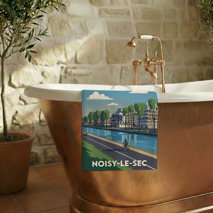 Serviette de bain souvenir de la ville de Noisy-le-Sec avec une illustration stylisée.